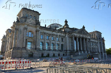 German Chancellor Olaf Scholz hands over to his successor Friedrich Merz