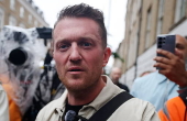 Political activist Tommy Robinson faces court over journalist harassment