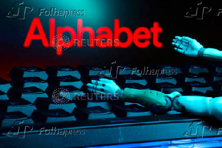 FILE PHOTO: Illustration shows Alphabet logo, keyboard and robot hands