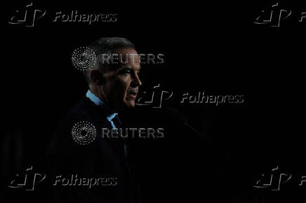Liberal Leader Mark Carney takes a question from a journalist following the French-language federal election debate, in Montreal