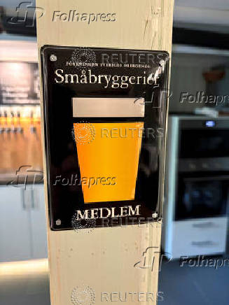 A beer sign is displayed at a microbrewery in Stockholm