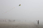 People enjoy the beach in West Wittering