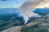 Smoke rises from the Mercoal Creek wildfire EWF030 east of the Yellowhead County town of Mercoal