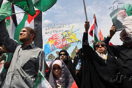 People attend a rally in support of the people of Gaza, after Friday prayers in Tehran