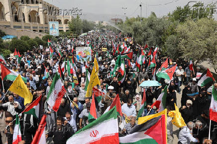 People attend a rally in support of the people of Gaza, after Friday prayers in Tehran