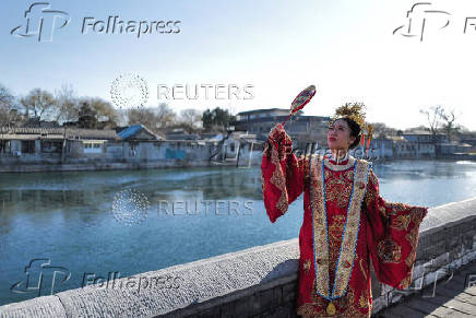 Tourists visit the Forbidden City in Beijing