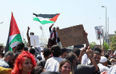 Demonstrators gather during a protest against hunger crisis in Gaza, near the embassy of Egypt in Beirut