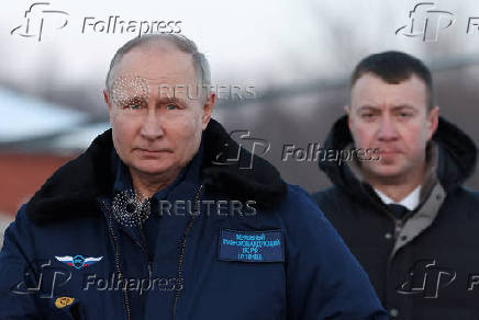 FILE PHOTO: Putin flies on modernised Russian supersonic strategic bomber