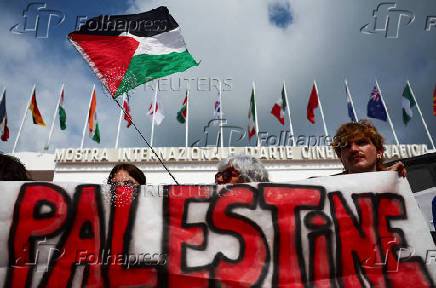 Supporters gather to call for Palestinian protest during the 82nd Venice Film Festival