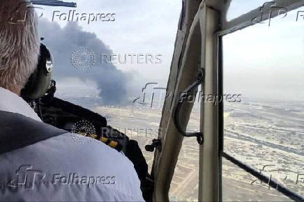 Smoke rises following an explosion at the Shahid Rajaee port in Bandar Abbas