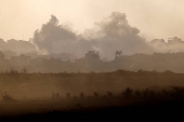 Smoke rises from Gaza after an explosion