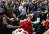 Farewell ceremony for three Ukrainian rescuers in Kyiv