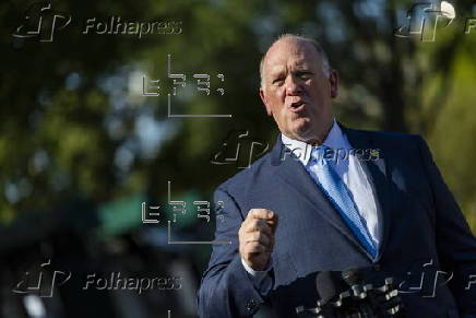 US Border Czar Tom Homan talks with news media outside the West Wing