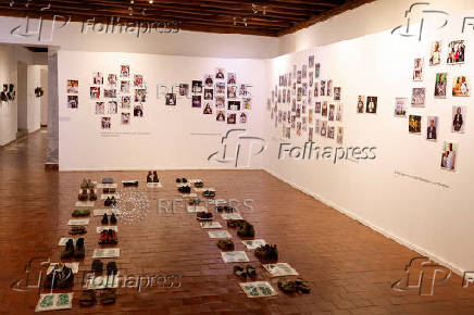 People attend an exhibition called 