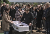 Ukraine bids farewell to three children killed in Russian attack in Zhytomyr region