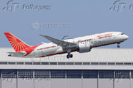 Air India Boeing 787 Dreamliner aircraft VT-ANB flies over Tokyo
