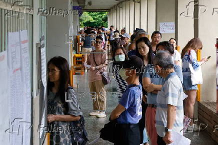 Voters cast their ballots in recall election for several Taiwanese legislators