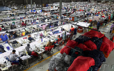 Workers perfom their duties at Quantum apparel factory on the outskirts of Maseru
