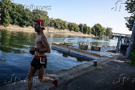 Seine river prepares for swimming season as part of Paris Plages