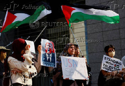 Protesters hold a rally denouncing the U.S. strikes on Iran's nucelar facilities, near the U.S. Embassy in Tokyo