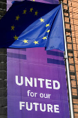 European Union flags flutter outside the European Commission headquarters in Brussels