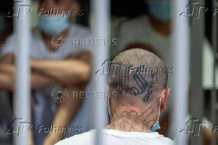 FILE PHOTO: A prisoner with a MS-13 gang tattoo