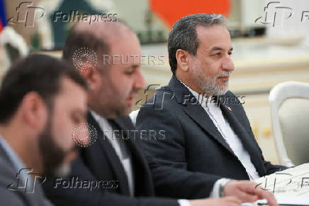 Russian President Vladimir Putin meets with Iranian Foreign Minister Abbas Araqchi in Moscow