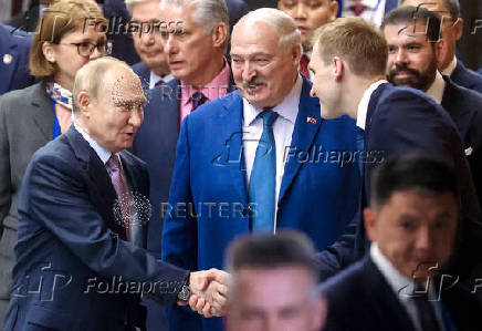 Russian President Vladimir Putin attends the Eurasian Economic Forum in Minsk