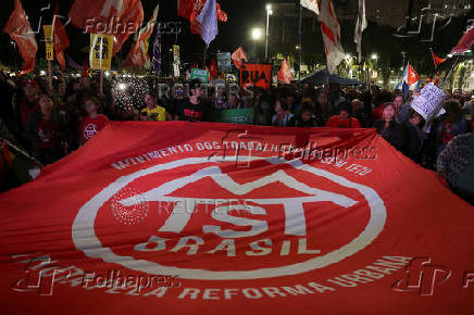 Demonstrators take part in a protest against U.S. President Donald Trump?s announcement of 50% tariffs on Brazilian products, in Rio de Janeiro