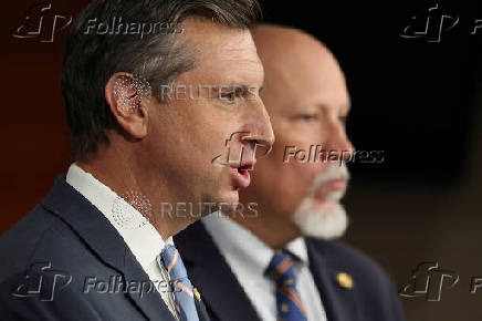 A bipartisan group of House members promote legislation to ban members of Congress from trading stocks on Capitol Hill in Washington
