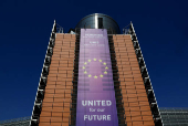 European Union flags flutter outside the European Commission headquarters in Brussels