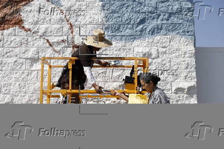Artist works on new mural for the Altadena community in the months following the Eaton fire