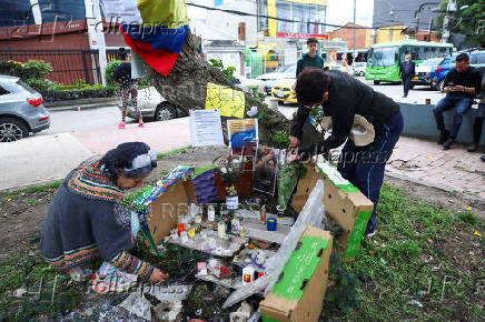 Tributes at place where Colombian Senator Uribe was shot during campaign event, in Bogota