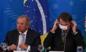 O presidente Jair Bolsonaro, ao lado do ministro da Economia, Paulo Guedes