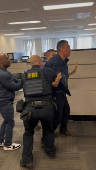 U.S. Senator Padilla is handcuffed by security during U.S. Homeland Security Secretary Noem's press conference, in Los Angeles