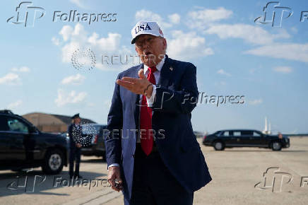 U.S. President Donald Trump boards Air Force One as he departs for Iowa, at Joint Base Andrews