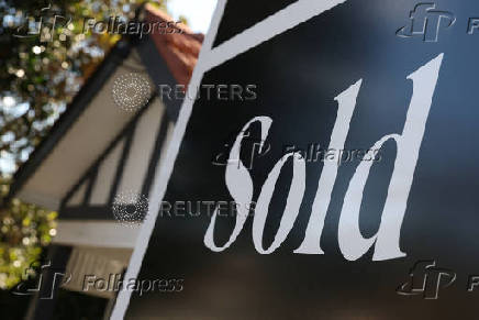 A ?sold? sign is displayed outside a residential property in Mosman