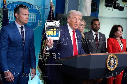 US President Donald Trump addresses the media at the White House