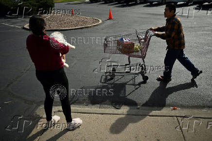 Food pantry is busy, weeks into the continuing U.S. government shutdown, in Commerce City