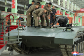 North Korea's leader Kim tours military equipment facility