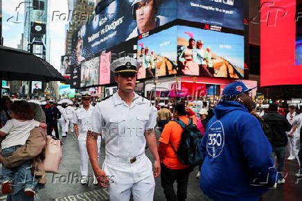 U.S. Navy sailors walk in Times Square during Fleet Week 2025 in New York City