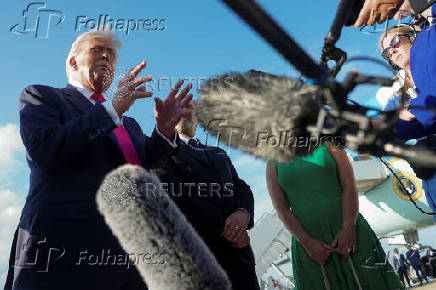 U.S. President Donald Trump speaks with the media at Joint Base Andrews
