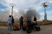 A wildfire burns on the outskirts of Valmojado