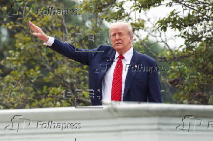 US President Trump walks on roof of the West Wing of the White House