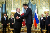 Russia's President Vladimir Putin meets Qatar's Emir Tamim bin Hamad Al Thani in Moscow