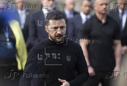 Ukrainian President Zelensky visits site of Russian missile strike in Kyiv