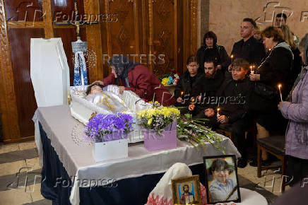Funeral of the Tamara, Stanislav and Roman Martyniuk who were killed in a Russian missile strike in Korostyshiv