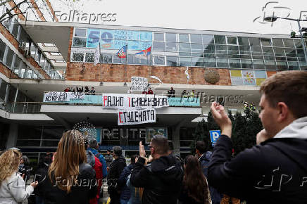 Students block access to the state broadcaster Radio Television of Serbia (RTS), demanding fair and unbiased reporting, in Belgrade