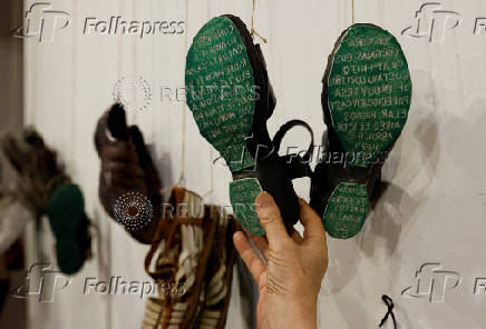 People attend an exhibition called 