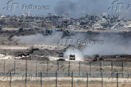Israeli military vehicles operate inside Gaza